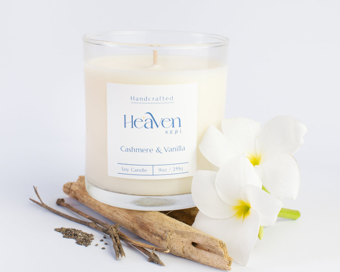 Luxury vanilla and cashmere scented candle styled in cozy modern home décor setting.