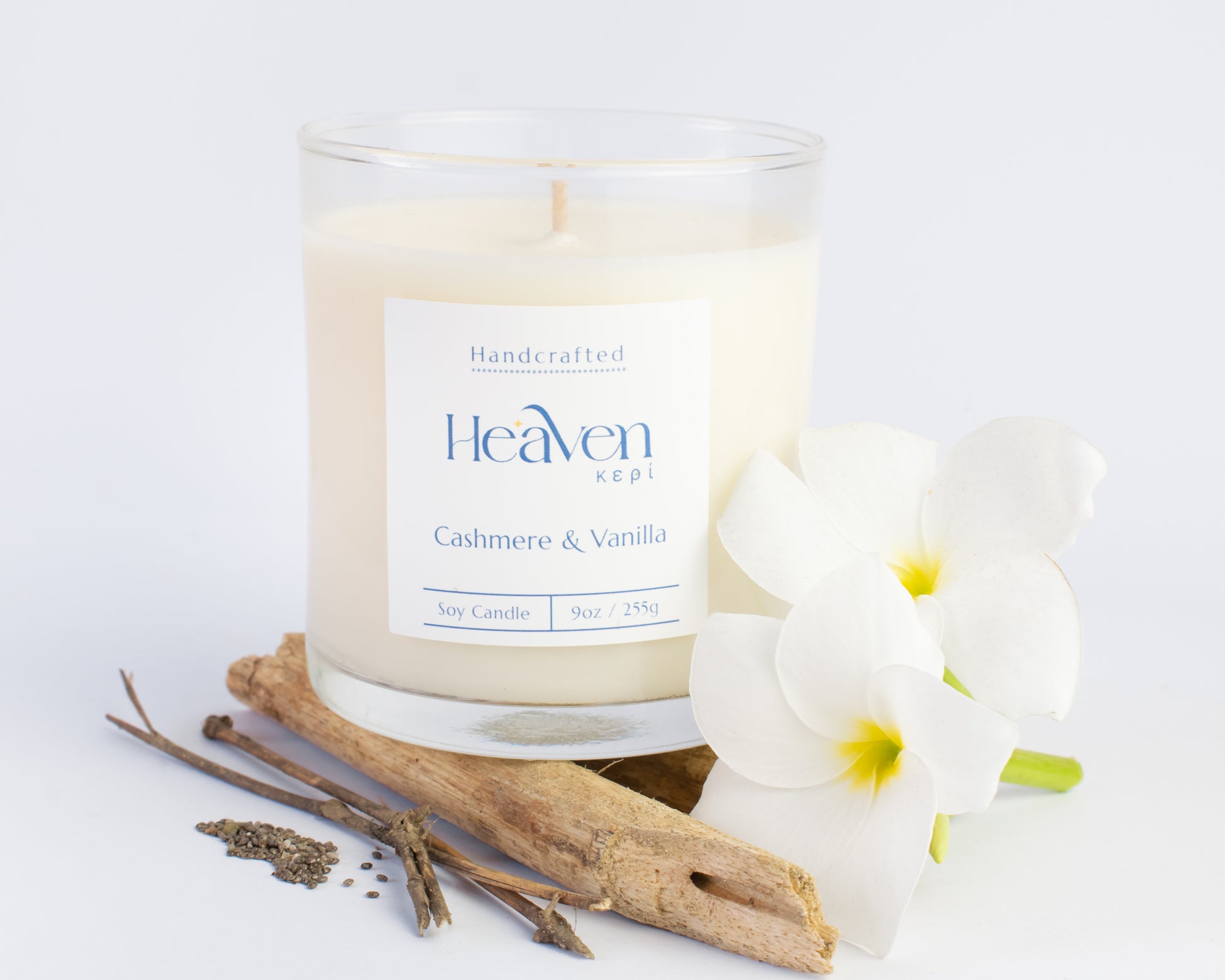 Luxury vanilla and cashmere scented candle styled in cozy modern home décor setting.