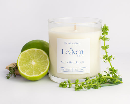 Artisan citrus and herb scented candle styled in clean modern home décor.