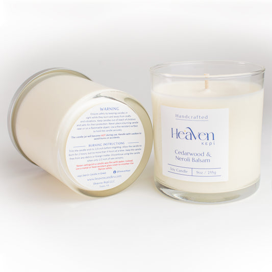 Grounding wood and floral scented candle styled in warm neutral home décor.