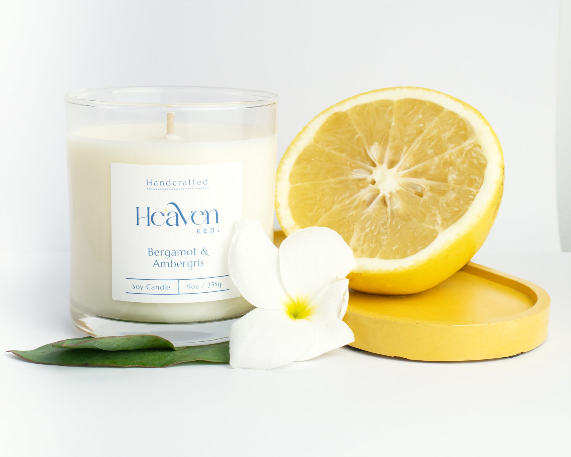 Citrus and woody fragrance candle styled in a modern minimal home setting.